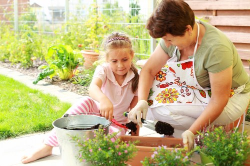 Horticultural specialist discussing planting plans at a garden site